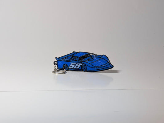 Blue race-car-shaped keychain with a white number & metal keyring