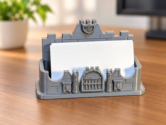Castle gatehouse business card holder with blank cards, edited desk background