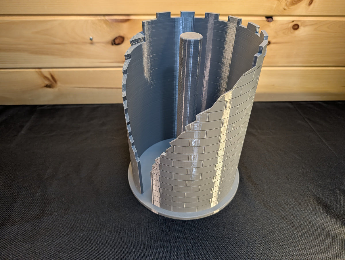 Empty castle ruins paper towel holder showing center spindle