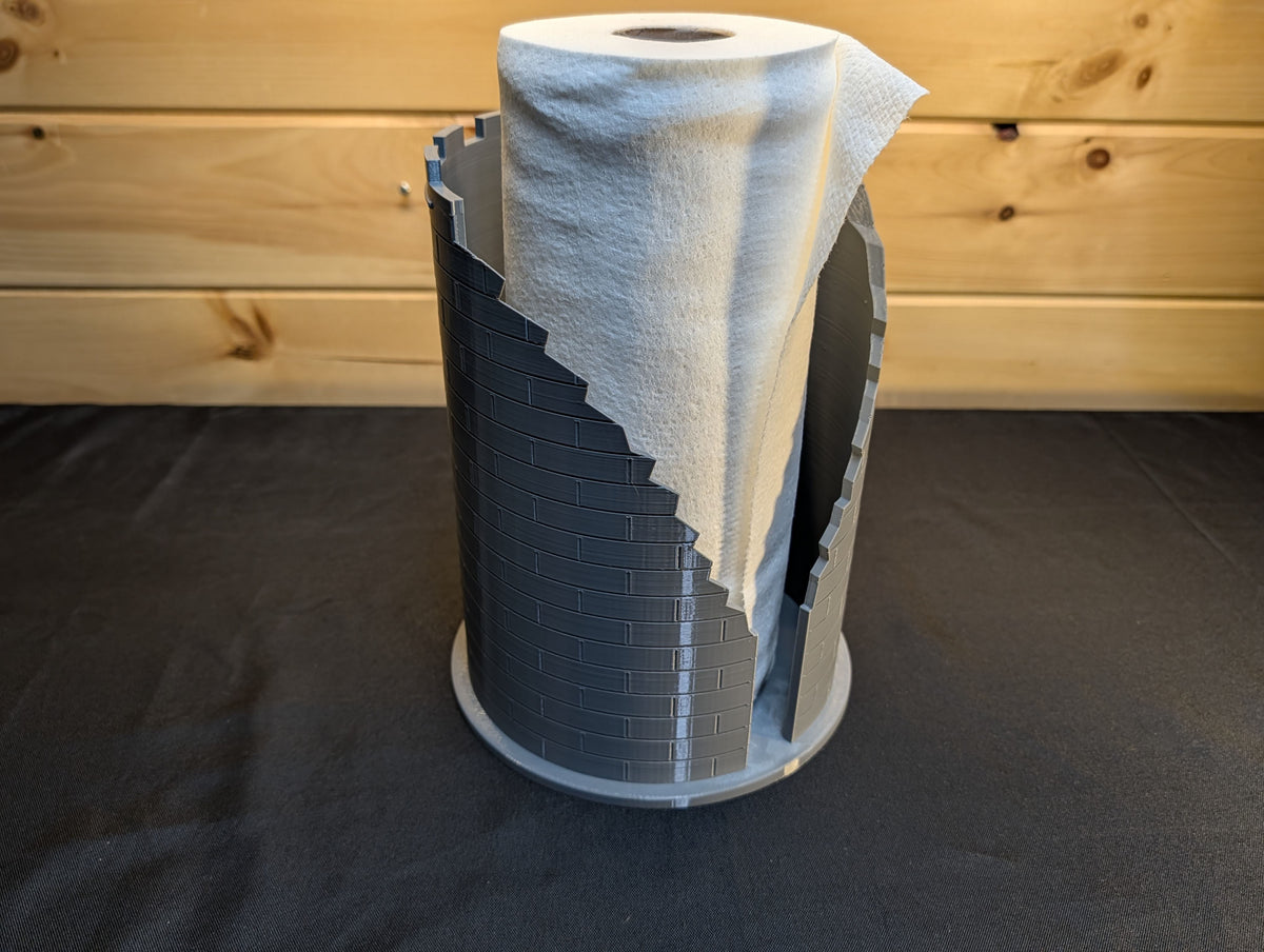 Castle ruins holder with paper end pulled through opening, original photograph