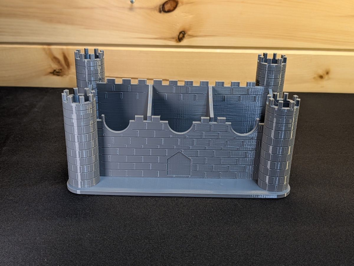 Unedited photograph of the empty Grey PETG castle remote holder
