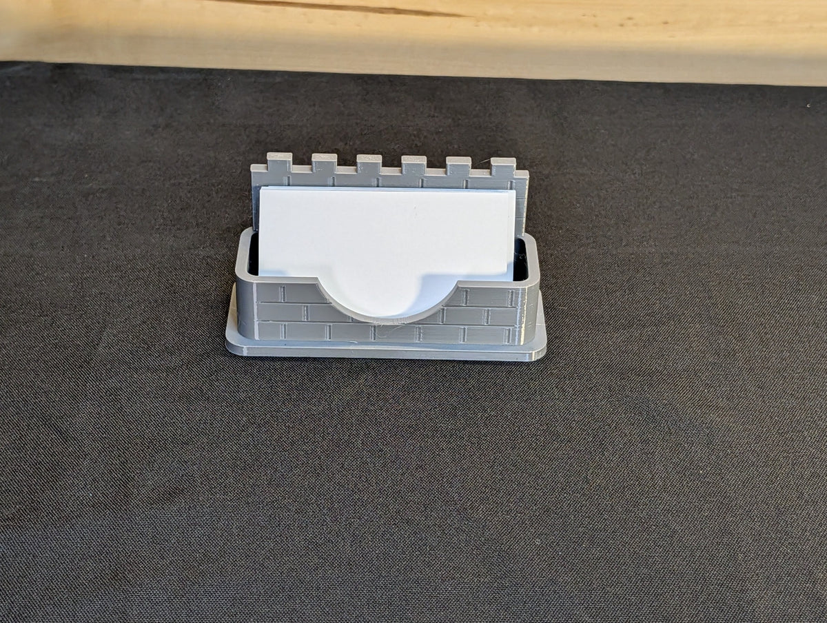 Original photograph of Grey castle wall card holder with blank business cards