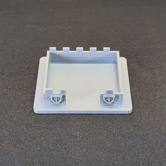 Demonstration of reaching and replacing a sticky-note pad in the castle holder