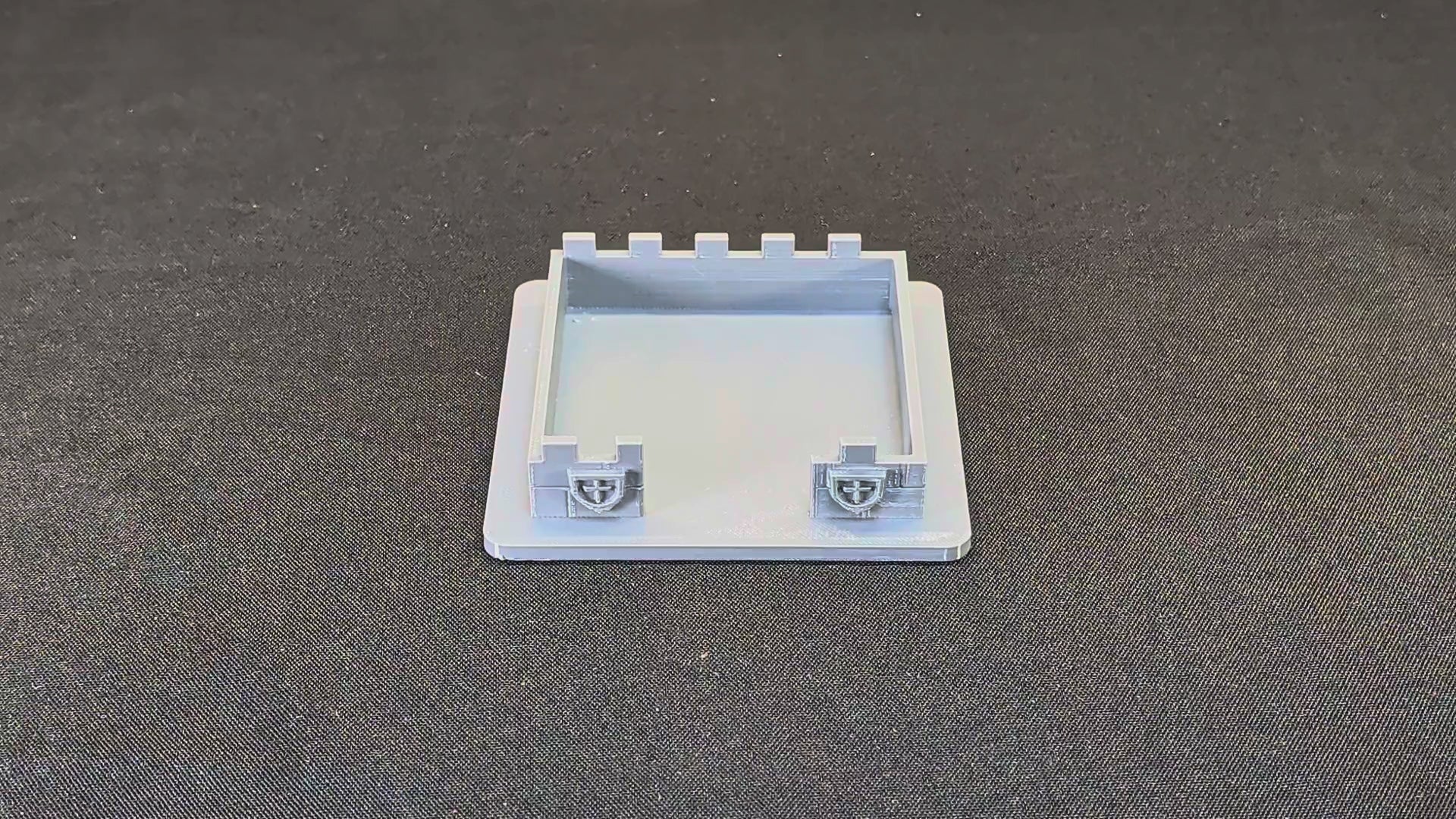 Demonstration of reaching and replacing a sticky-note pad in the castle holder
