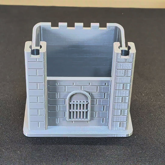 Actual grey castle pen holder with pens and markers