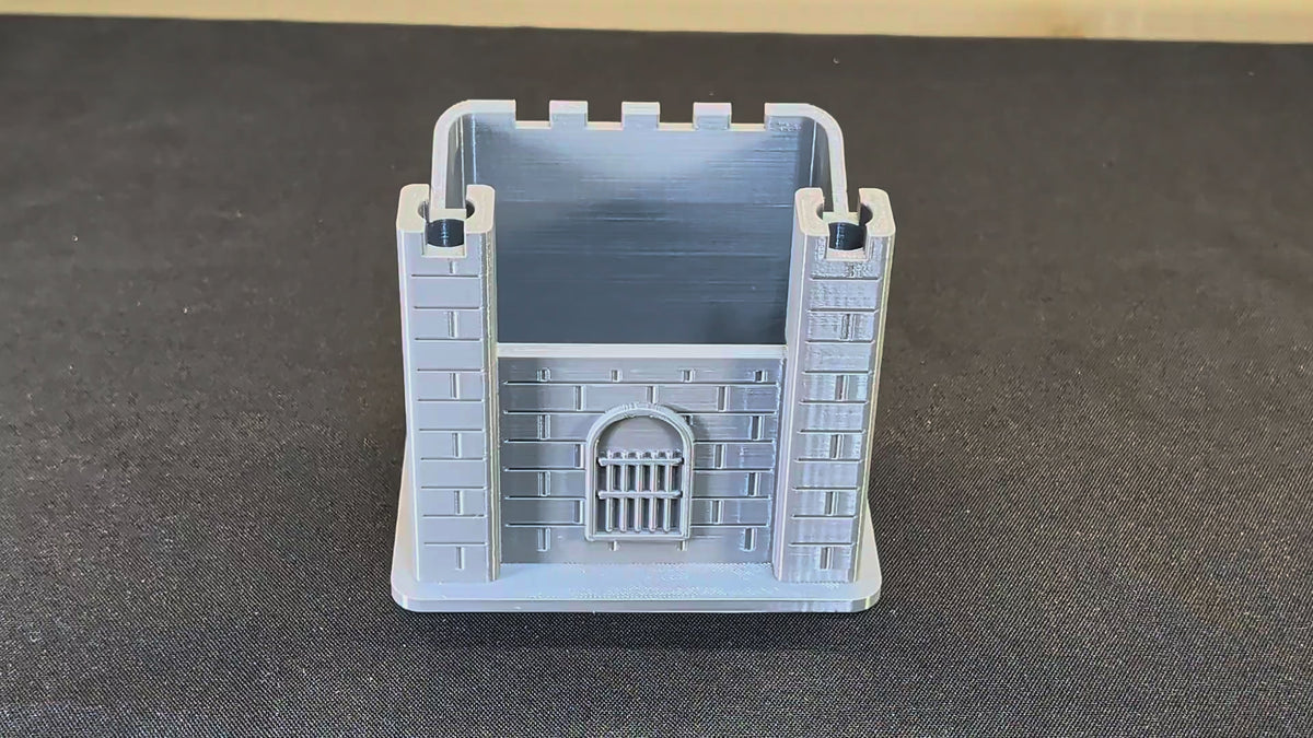 Actual grey castle pen holder with pens and markers