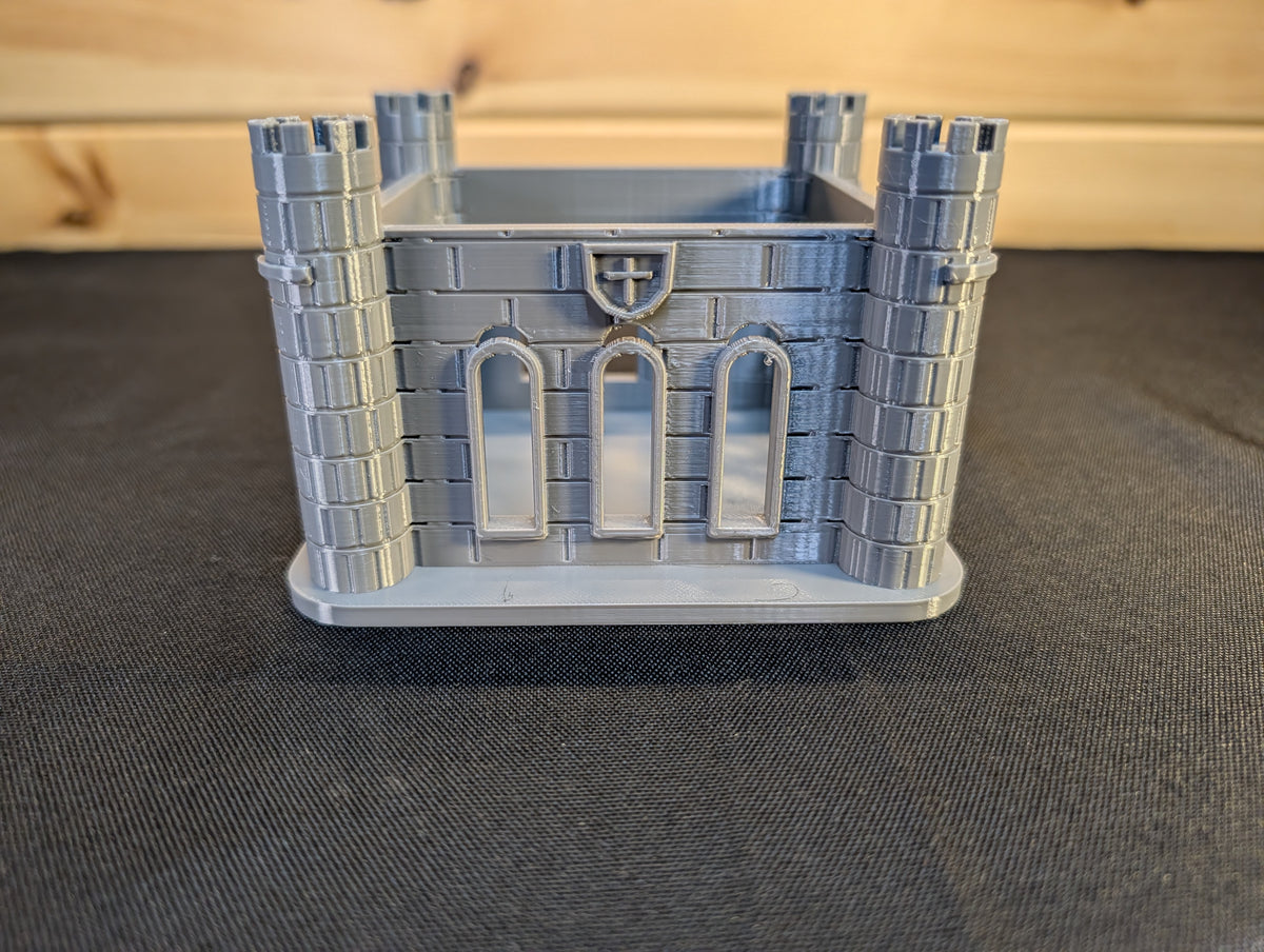 Front detail of square castle dice jail